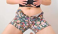 she undresses and fucks with her big tits in a cute solo scene