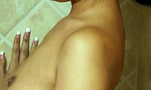 tiny brunette gets wet in hot shower