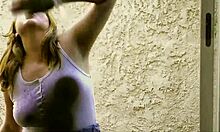 Big Girl Riley Teases With Her Tits And Ass While Washing The Window!