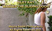 Big Girl Riley Teases With Her Tits And Ass While Washing The Window!