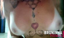 Feeling the heat as tanned babe shakes big tits to reggaeton rhythm