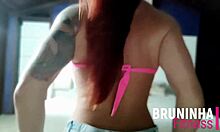 Feeling the heat as tanned babe shakes big tits to reggaeton rhythm