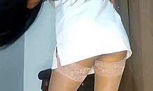 Sassy nurse flashes and masturbates with dildo, 'Am I wet enough for you, patient?' Colombian brunette exhibitionist.