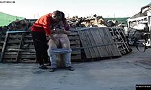 The FAT horny spanish couple FUCKS on a LOG outdoors exposing CUNT and ASS