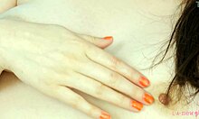 radiant brunette shows her flawless body