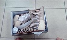 Beautiful Redhead Mature Woman Tries On Sandals In Shoe Shop, Showcasing Glamorous Feet