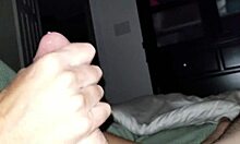Amateur gives oiled handjob until precum leaks from cock