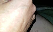 Amateur gives oiled handjob until precum leaks from cock