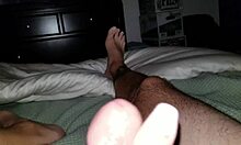 Amateur gives oiled handjob until precum leaks from cock