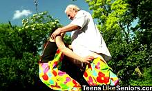 gorgeous brunette teen blows older lover outdoors