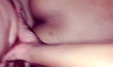 brunette young woman enjoys a relaxing solo session with amateurs