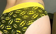 close-up faceless young babe trying on panties from mv store in gym