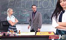 two young skinny girls taking turns sucking the teacher's cock in a hot oral session.