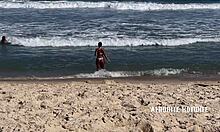 Afrodite sucks cock bent over on the beach.