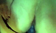 In the bath, the girl uses a dildo and a sock as a makeshift cock for a homemade blowjob.