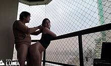 housewife enjoying outdoor activity on balcony