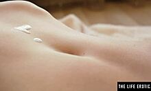 Cute teen oils her shaved pussy and masturbates to orgasm?