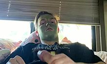 Fit guy strokes his cock during skin care routine