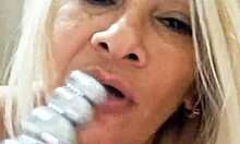 Milf plays with vibrating dildo toys in naked fetish session