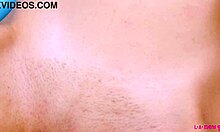 Glamorous brunette strips for close-up photoshoot interview