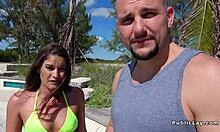 Hottie in bikini top sucks cock outdoor on beach