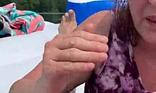 Amazing outdoor blowjob featuring big natural tits and cumshot!