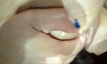 A fiery redhead tempts with her curves and tattoos