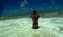 Muscular guy shaking his ass at the beach in tambaba