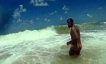 Muscular guy shaking his ass at the beach in tambaba