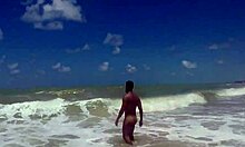 Muscular guy shaking his ass at the beach in tambaba