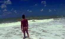 Muscular guy shaking his ass at the beach in tambaba