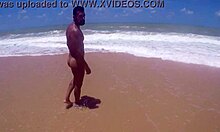 Muscular guy shaking his ass at the beach in tambaba