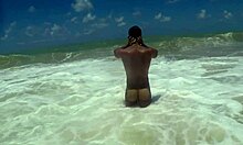 Muscular guy shaking his ass at the beach in tambaba