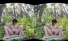 Soshabelle squirts outdoors with toys