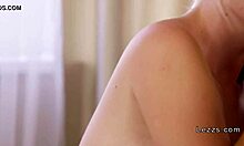 These hot blonde lesbians are kissing passionately in the woods