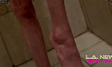 Skinny brunette teen relaxes in the shower