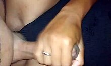 my girlfriend gives a handjob to my friend, leading to a cumshot in this casual homemade video.