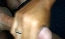 my girlfriend gives a handjob to my friend, leading to a cumshot in this casual homemade video.