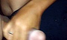 my girlfriend gives a handjob to my friend, leading to a cumshot in this casual homemade video.