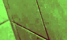 Skinny brunette teen relaxes in the shower