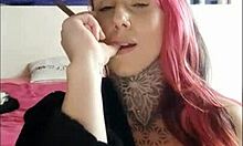 sensual girl smoking and teasing on webcam