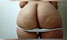 latina dances horny for neighbor, showing curvy ass and tits with passionate moves