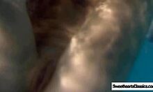 Lesbian team licks and fingers in garden outdoor fun