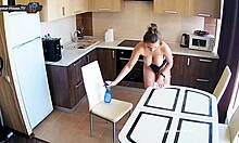 big tits beauty cleans kitchen topless with sexy piercing