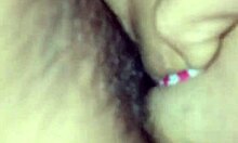 latina woman engages in intimate activity on all fours