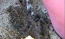 my african wife takes a long pee on the beach, amateur footage