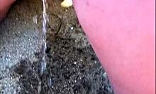 my african wife takes a long pee on the beach, amateur footage