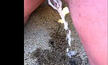 my african wife takes a long pee on the beach, amateur footage