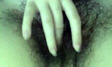 A hairy teen babe performs on webcam for viewers