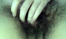 A hairy teen babe performs on webcam for viewers